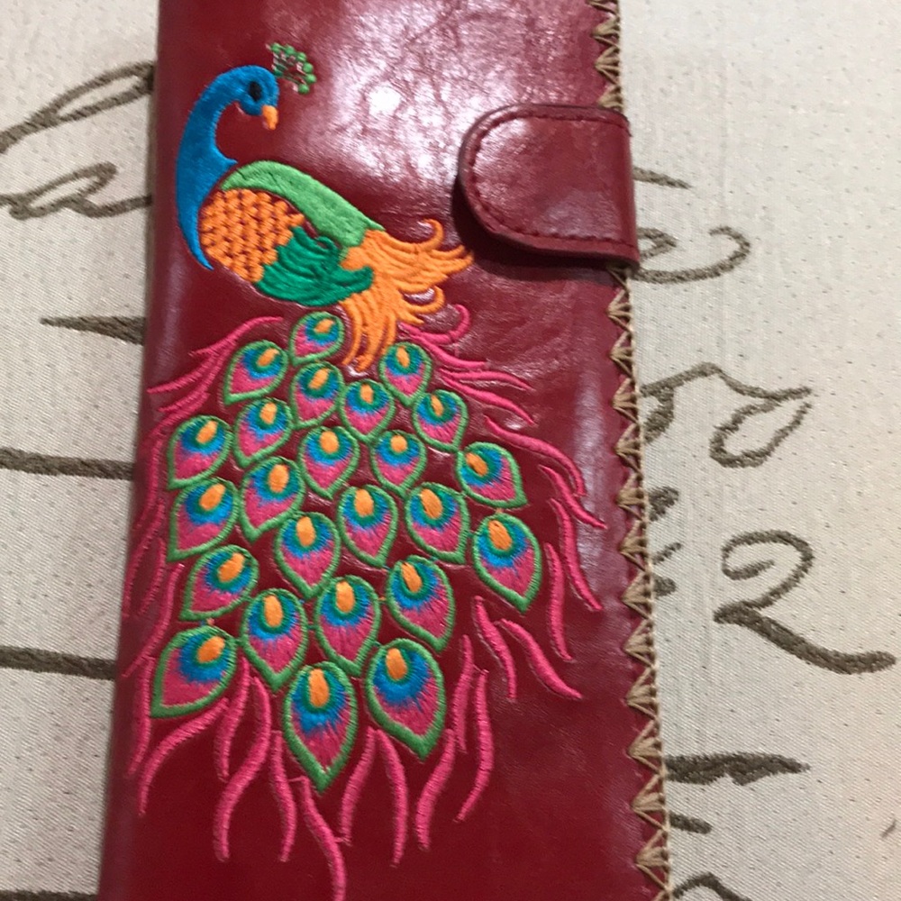 Lavish Brand leather wallet with peacock art!